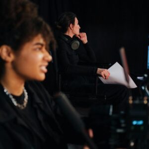 Focused film crew members work passionately on set, creating cinema magic.